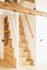 Staircase, Wood Railing, and Wood Tread Bespoke timber steps with integrated shelving  Photo 3 of 10 in Hackney Lofts by Georgie Scott