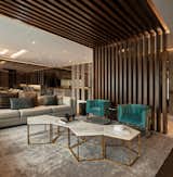 Living Room, Sofa, Carpet Floor, Marble Floor, Coffee Tables, Ceiling Lighting, Sectional, and Chair  Photo 13 of 20 in Departamento Arboledas by Guillermo Tirado