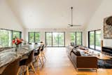 Living Room, Ceiling Lighting, Recessed Lighting, and Light Hardwood Floor Vaulted ceilings, luxury kitchen with leathered marble  Photo 8 of 14 in The Overlook by Emily Iason