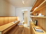 Office, Medium Hardwood Floor, Study Room Type, Chair, Desk, Shelves, Lamps, and Bookcase The study – Each section of the apartment was thoughtfully designed to optimize living space, ensuring functionality and purposefulness in every area.  Photo 9 of 21 in Penthouse in a Park by SHIRVANI & OESTERLE