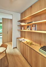 Office, Study Room Type, Storage, Shelves, Medium Hardwood Floor, and Bookcase The study  Photo 10 of 21 in Penthouse in a Park by SHIRVANI & OESTERLE
