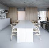 Dining Room, Pendant Lighting, Concrete Floor, Table, and Stools  Photo 9 of 12 in Senso for Sitzler Berlin by David Bols