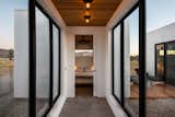 Hallway and Concrete Floor  Photo 8 of 24 in Joshua Tree Desert Minimal New Build by Clayton Baldwin