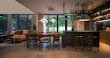 Dining Room, Porcelain Tile Floor, Table, Bar, and Pendant Lighting Dining  Photo 9 of 30 in D Residence by Creative Territories