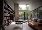 Living Room, Coffee Tables, Porcelain Tile Floor, Sofa, Chair, and Bookcase Living Room  Photo 12 of 30 in D Residence by Creative Territories