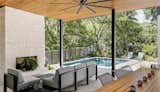 Outdoor, Shrubs, Hardscapes, Walkways, Back Yard, Trees, Raised Planters, Swimming Pools, Tubs, Shower, and Horizontal Fences, Wall Cove House Back Patio  Photo 14 of 16 in The Cove House by J Christopher Architecture