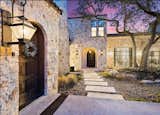 Exterior, House Building Type, Tile Roof Material, Wood Siding Material, and Stone Siding Material Front Entry with Landscape Lighting  Photo 5 of 23 in The Knoll House- A Tuscan Villa by J Christopher Architecture