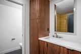 Bath Room, Alcove Tub, Ceramic Tile Wall, Accent Lighting, Concrete Floor, and Drop In Sink Lower bath   Photo 3 of 10 in Lantern Road Home by Cedar Street Builders