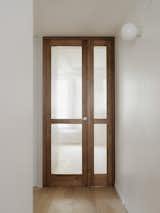 Doors, Wood, Swing Door Type, and Interior Entrance to the master bedroom.   Photo 12 of 18 in The MUSC project - an appartement in the historic heart of Paris by PAREIL