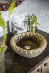 Hand-carved and hand-painted stone basin