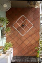  Terrace terracotta wall with folk art mural