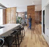 Engineered Quartz Counter, Kitchen, White Cabinet, Light Hardwood Floor, and Wood Cabinet Kitchen & Dining  Photo 2 of 8 in 1675 Madison by Hermanos Design