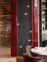 Red lacquer columns are adorned with custom made dragon scale ceramic tiles.  