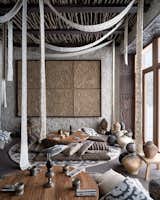 Tambour embroidery to the linen ribbons hanging from the ceiling by  Tumar craftswomen.