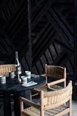 Carved dark wood wall.