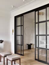 Doors, Interior, and Sliding Door Type Glass doors dividing entrance area and living room.  Photo 6 of 16 in Stylish French-inspired apartment in Moscow by Anna Maria Abara