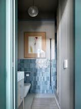 Bathroom.  Photo 18 of 20 in Colorful two-level apartment with expressive palette by Anna Maria Abara