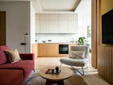 Floor lamp by MENU.
The painting “Feel” in the sofa area by Lera Popova.