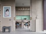 Kitchen with dining table.
Chandelier by Arteriors.
Photo on the wall by Jung Cheng Lin.
Vase on the right by Ekaterina Feus.
Custom-made door handles from France.

