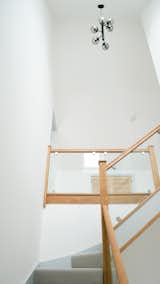 Staircase, Glass Railing, and Wood Tread Landing  Photo 7 of 12 in The Swale self-build by Deborah Hastie
