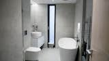 Bath Room, Wall Mount Sink, and Freestanding Tub Bathroom  Photo 2 of 17 in HARI haus