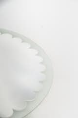Duality Mirror
The Duality mirror is a round mirror with a sandblasted frame scalloped edges, the frame can optionally highlighted 
with back illumination.