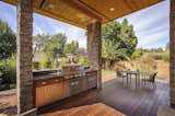 Outdoor, Stone Patio, Porch, Deck, Back Yard, Large Patio, Porch, Deck, and Wood Patio, Porch, Deck Outdoor entertaining  Photo 6 of 10 in Burlingame Residence by Cipriani Studios