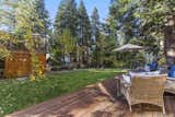 Outdoor, Wood Fences, Wall, Trees, Grass, Back Yard, Garden, and Wood Patio, Porch, Deck  Photo 5 of 36 in Tahoe Chalet & Guesthouse $1,850,000 by Carina Cutler