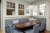 Dining Room and Bench The homeowners cherished their original floor plan’s ability to dine within the kitchen’s heart. When we redesigned the kitchen layout, we kept this area at the forefront of our minds.  Photo 5 of 8 in Spanish Colonial by Quartersawn Design Build