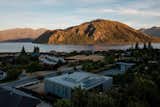 Penrith Peaks site with morning sun hitting the peninsula at Lake Wānaka