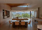 Dining table and living area at Penrith Peaks