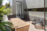 Outdoor This serene outdoor escape is the perfect place to relax and enjoy the sunlight.  Photo 3 of 13 in A collectors Retreat by Bjorn Design