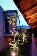 Outdoor, Garden, Landscape Lighting, Trees, and Stone Fences, Wall Courtyard  Photo 12 of 27 in Villa in Raizan by TAPO tomioka architectural planning office