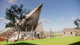 A semi-open gathering space invites visitors for a discussion and interaction session.