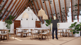 The cafe becomes a peaceful pause point for visitors to calmly enjoy a cup of hot coffee.