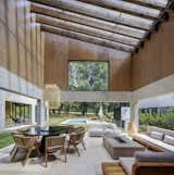 Outdoor, Large Patio, Porch, Deck, Back Yard, Concrete Pools, Tubs, Shower, Wood Patio, Porch, Deck, Concrete Patio, Porch, Deck, Small Pools, Tubs, Shower, Trees, Hanging Lighting, Wood Fences, Wall, and Landscape Lighting  Photo 4 of 19 in Noah House by Cadaval Estudio