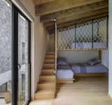 Bedroom, Bunks, Bed, Ceiling Lighting, and Medium Hardwood Floor  Photo 13 of 19 in Noah House by Cadaval Estudio