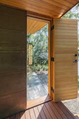 Doors, Exterior, Swing Door Type, and Wood Sauna entry  Photo 4 of 6 in Lake Sauna by E. Cobb Architects