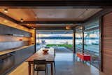 Kitchen/dining view to lake - concealed pocket door creates seamless indoor/outdoor living