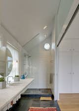 Bath Room, Recessed Lighting, Engineered Quartz Counter, Open Shower, Undermount Sink, Porcelain Tile Floor, and Ceramic Tile Wall Primary Bathroom   Photo 7 of 11 in Dutch Light by E. Cobb Architects