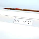 sliding door reveals concealed power supply  Photo 2 of 5 in Task Smart desk an integrated approach
