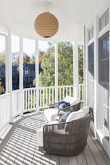 The wraparound porch was shamefully underused by the previous homeowners. Repainting and adding new light fixtures and cozy furniture has made this a favorite spot. 