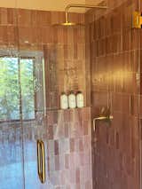 Bath Room, Terrazzo Floor, Engineered Quartz Counter, Vessel Sink, One Piece Toilet, Wall Lighting, and Ceramic Tile Wall Loft Bathroom Shower   Photo 4 of 12 in Moonlight Pines by Bre Derby