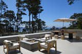 Terrace, showing the firepit / seating area and dining table
