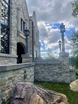 Castle terrace. Custom railing and lampposts. Outdoor living area.  Photo 5 of 359 in Huntington Manor by JMAD