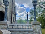 Castle terrace. Custom railing and lampposts. Outdoor living area.