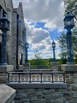 Castle terrace. Custom railing and lampposts. Outdoor living area.