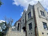 Castle terrace. Custom railing and lampposts. Outdoor living area.  Photo 12 of 359 in Huntington Manor by JMAD