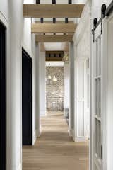 Hallway and Light Hardwood Floor Hallway.  Photo 11 of 297 in Shingle Style Lodge by JMAD