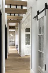 Hallway and Light Hardwood Floor Hallway.  Photo 14 of 297 in Shingle Style Lodge by JMAD